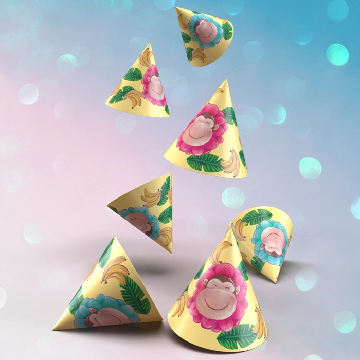 Gula partyhattar med apor och bananer