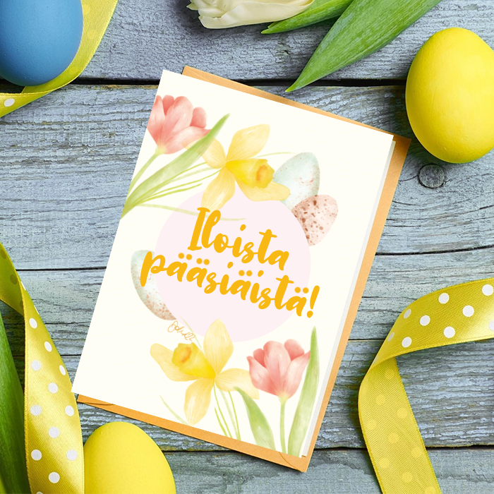 Pääsiäiskortti pöydällä munia ja keltaisia nauhoja ympärillä.